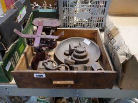 Set of vintage scales with various weights and weight mould