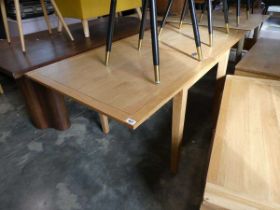 Modern light oak effect dining table