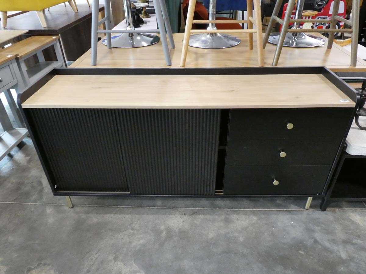 Modern black sideboard with ribbed sliding doors and 3 drawers