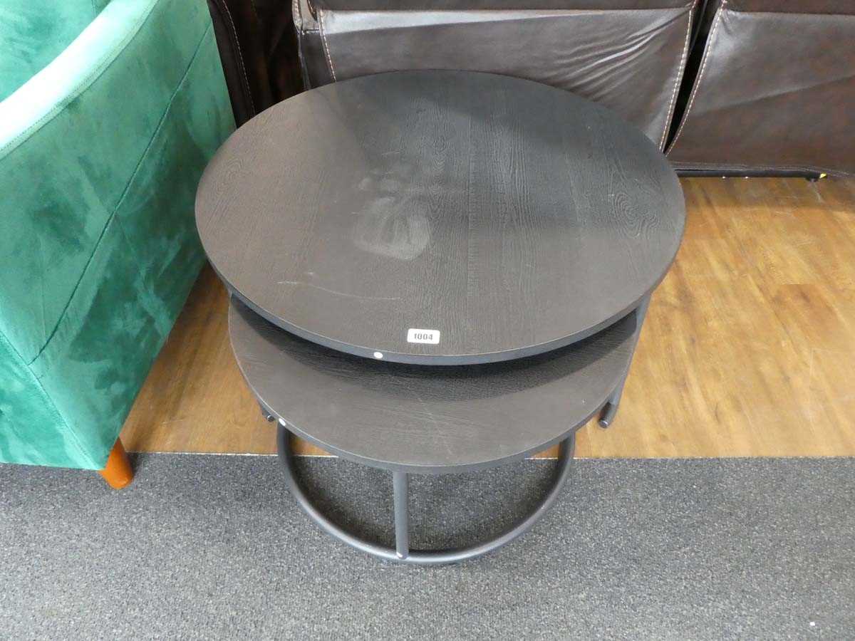 Modern nesting pair of black circular coffee tables