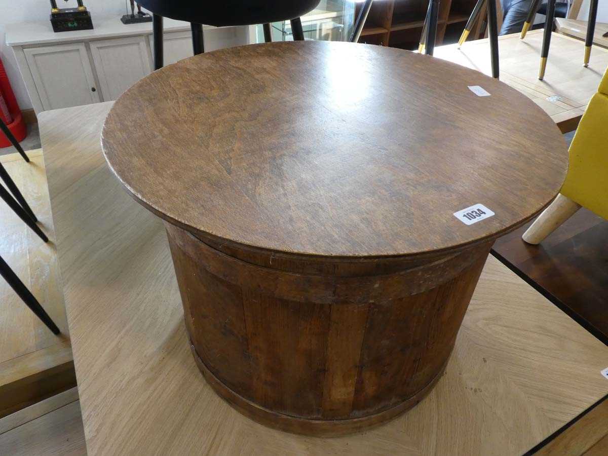 Drum shaped coffee table with ply surface