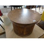 Drum shaped coffee table with ply surface