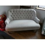 +VAT Modern natural coloured button backed 2 seater sofa on limed wood supports
