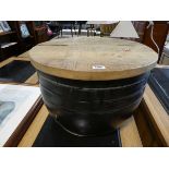 Metal drum shaped coffee table with oak lift lid storage