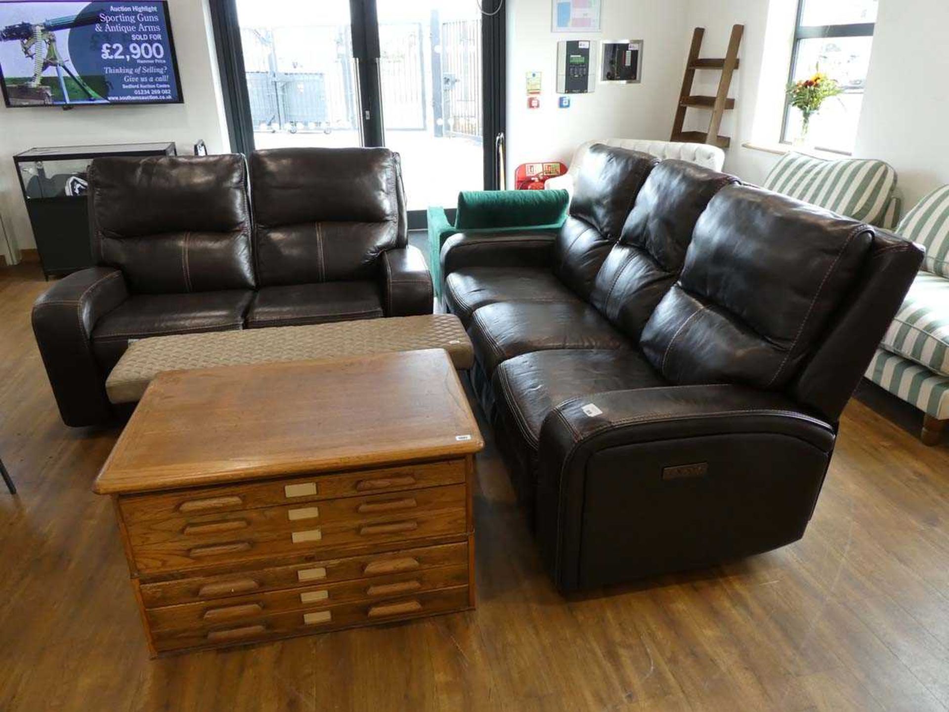 +VAT Modern brown leather upholstered reclining lounge suite comprising a 3 seater sofa and matching