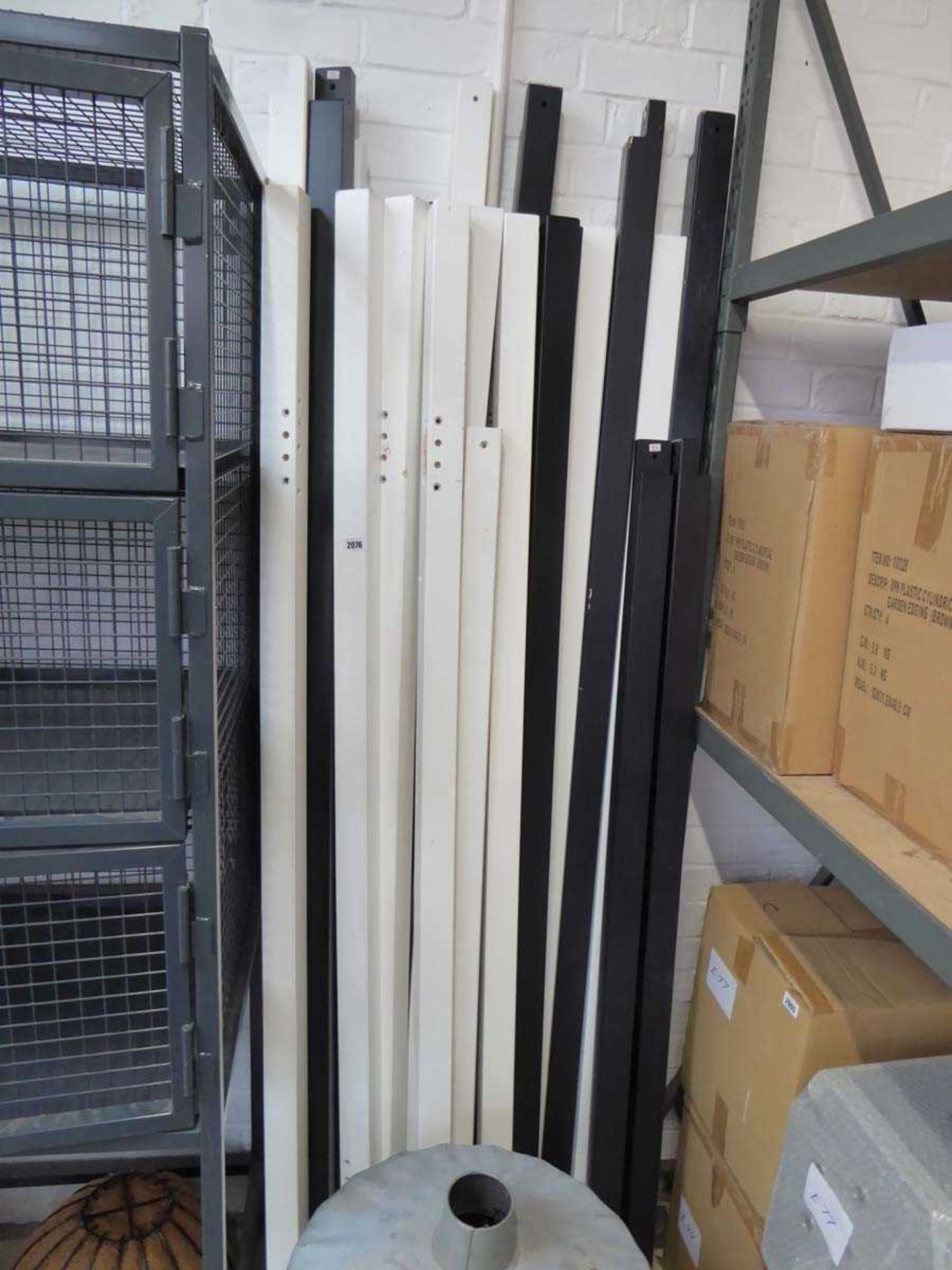 Large quantity of upright wooden posts