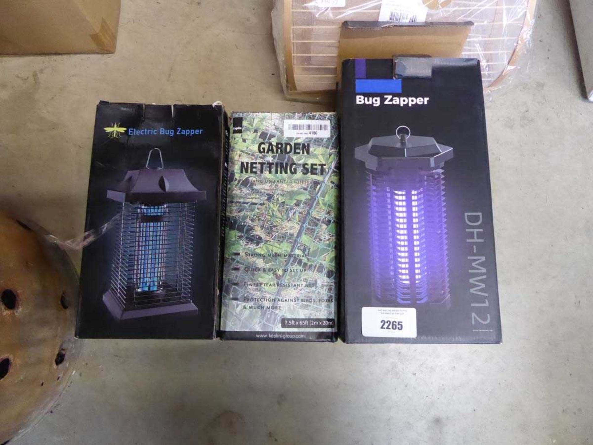 +VAT 2 electric bug zappers, together with a garden netting set