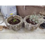 Pair of weathered concrete planters
