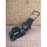 Hayter Harrier 41 self propelled petrol lawn mower with rear roller attachments