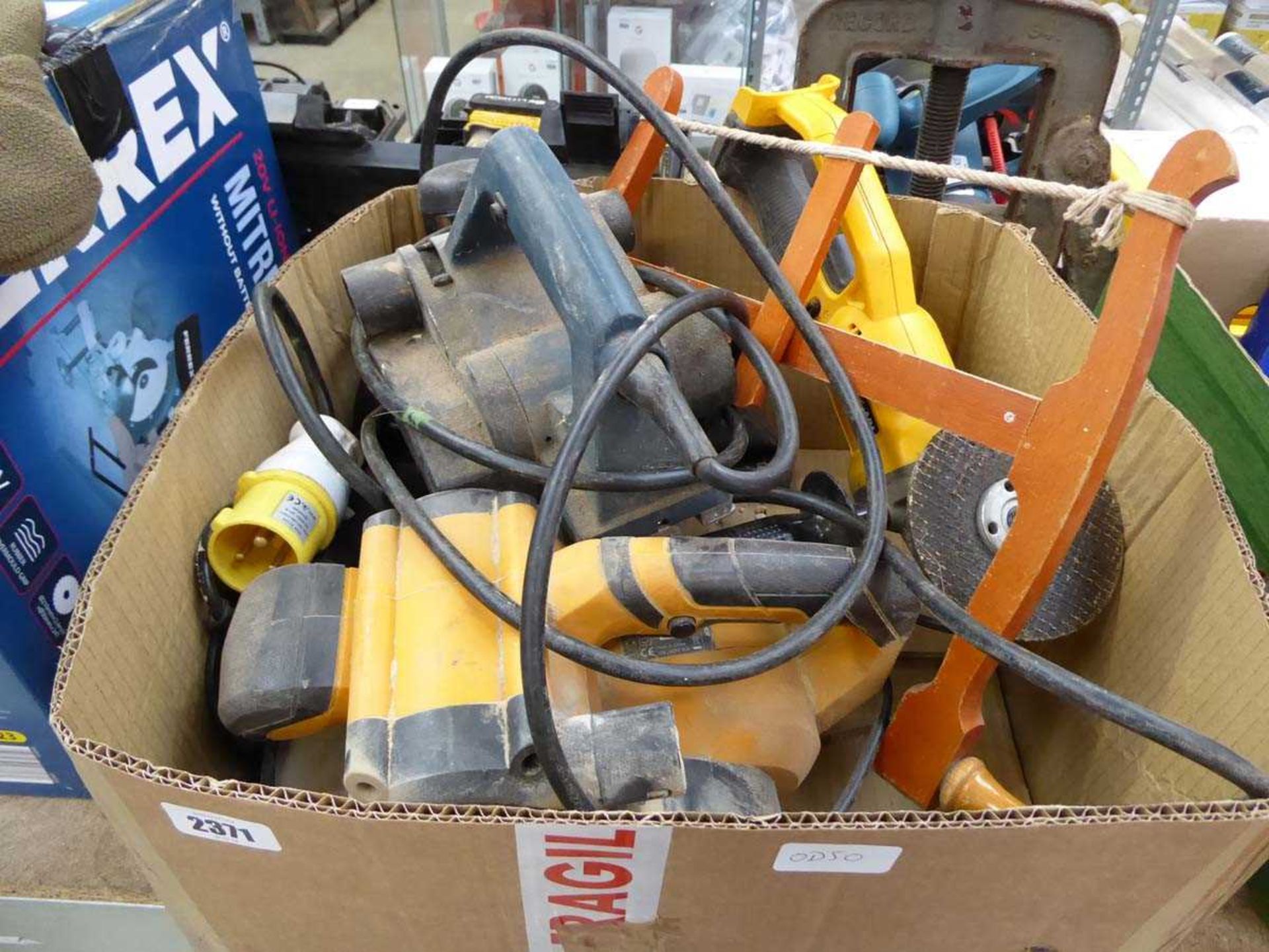 Crate containing mixed tooling incl. electric planers, angle grinder, etc.