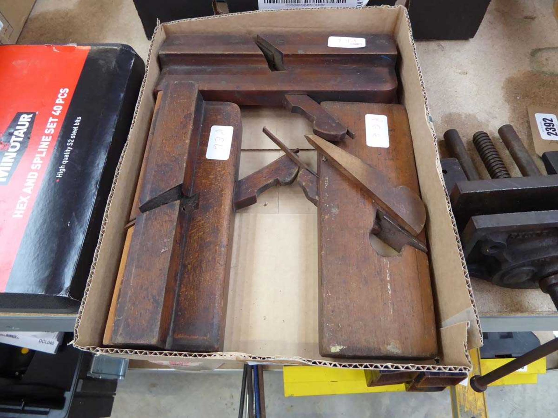 Shallow crate containing 3 vintage carpentry planes