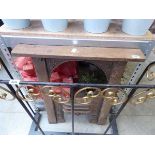 Weathered cast iron fireplace front