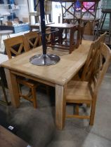 Modern light oak dining table with 6 matching chairs