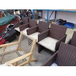 Set of 4 brown rattan outdoor garden chairs each, with matching cream cushions