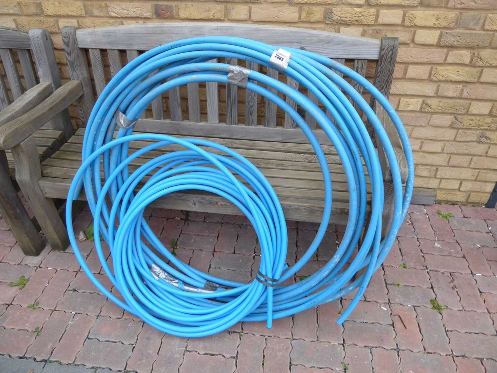 Quantity of blue irrigation hosing