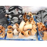 Pallet containing a large quantity of 6in. drainage parts and accessories