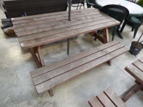 Wooden slatted picnic bench