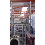 Aluminum scaffold tower with associated accessories