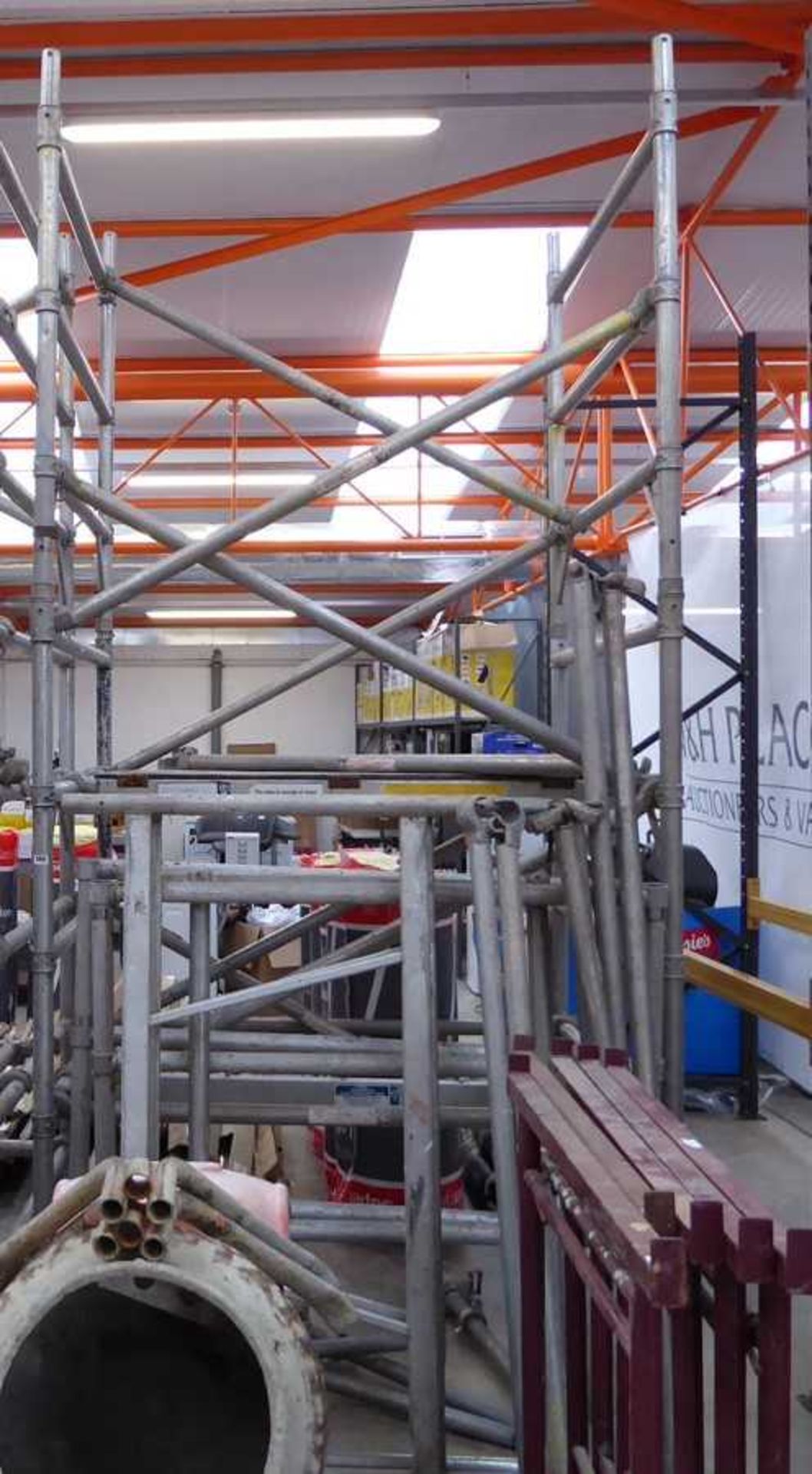 Aluminum scaffold tower with associated accessories