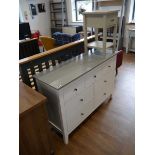 Modern grey and white lowboy with an arrangement of 7 drawers, together with a single drawer bedside