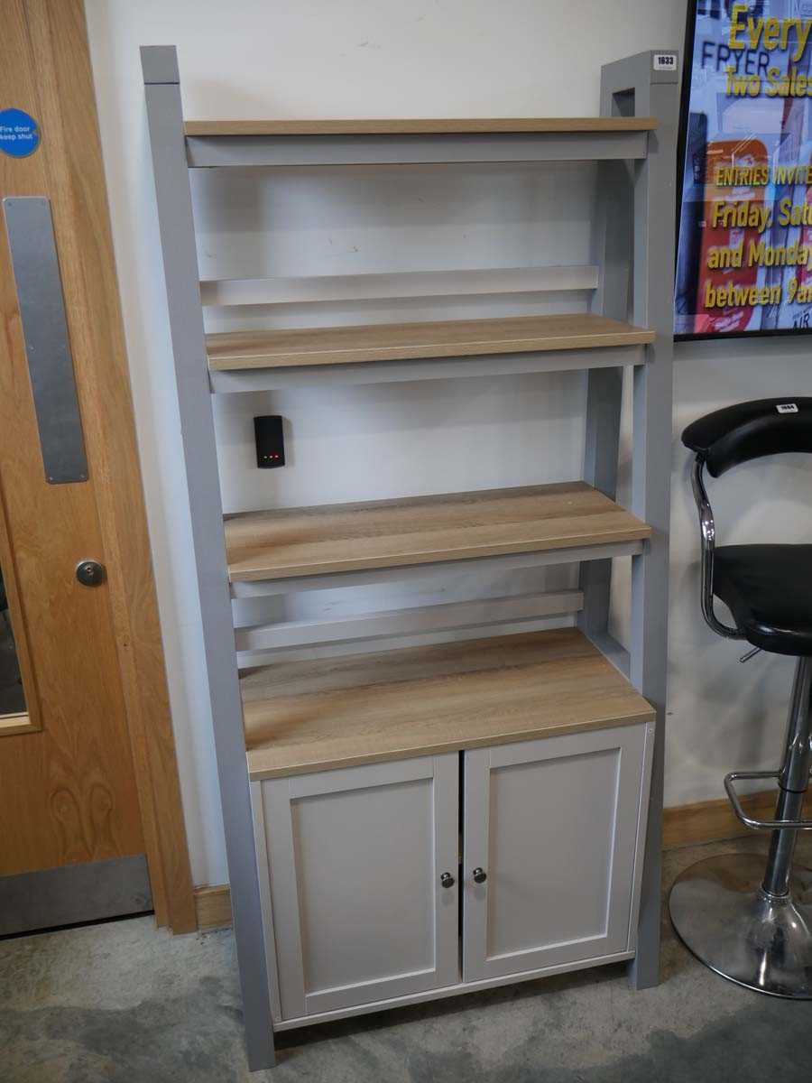 Modern grey and hardwood finish ladder shelf unit with cupboard to base