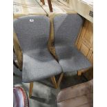 +VAT Modern pair of grey upholstered dining chairs on tapered wooden supports