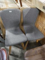 +VAT Modern pair of grey upholstered dining chairs on tapered wooden supports