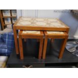 Mid century teak framed tile top coffee table with 2 further occasional tables nesting beneath