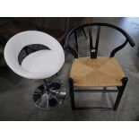 Modern black 'wishbone' type rush seated dining chair and modern white leatherette upholstered bar