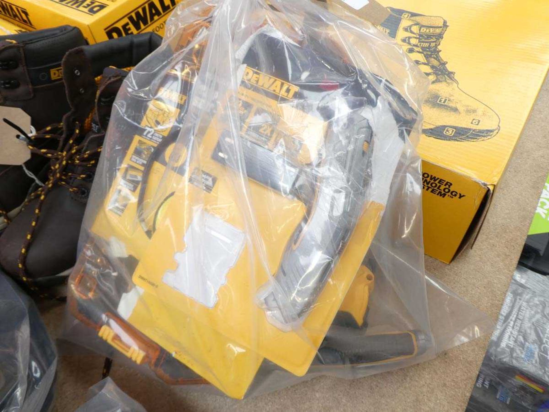 +VAT Bag containing various DeWalt tooling incl. Stanley knife, tape measures, socket set, etc.