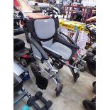 Grey folding wheelchair