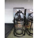 +VAT 1 boxed and 1 unboxed black metal solar lanterns