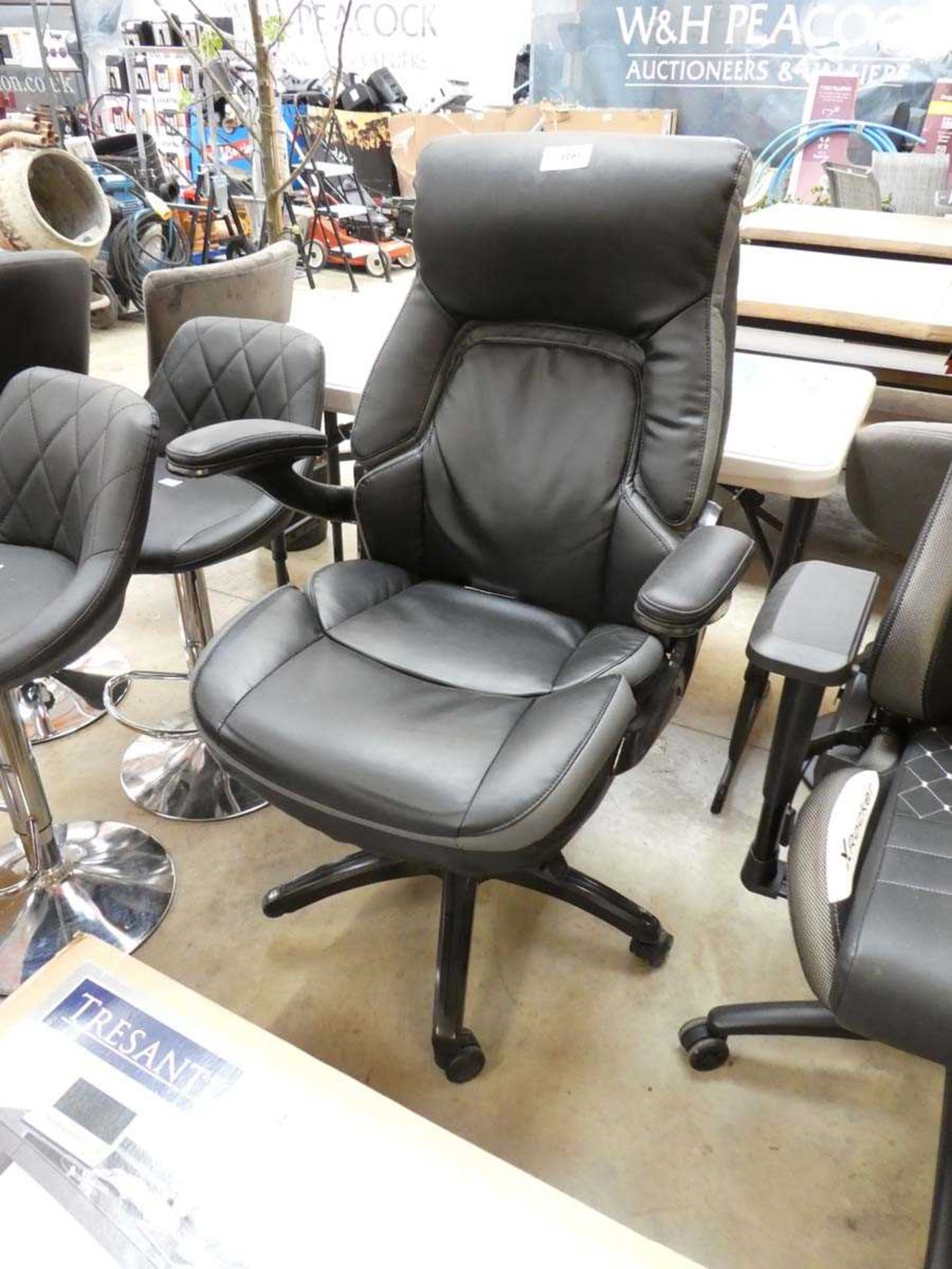+VAT Black swivel office chair with missing wheel