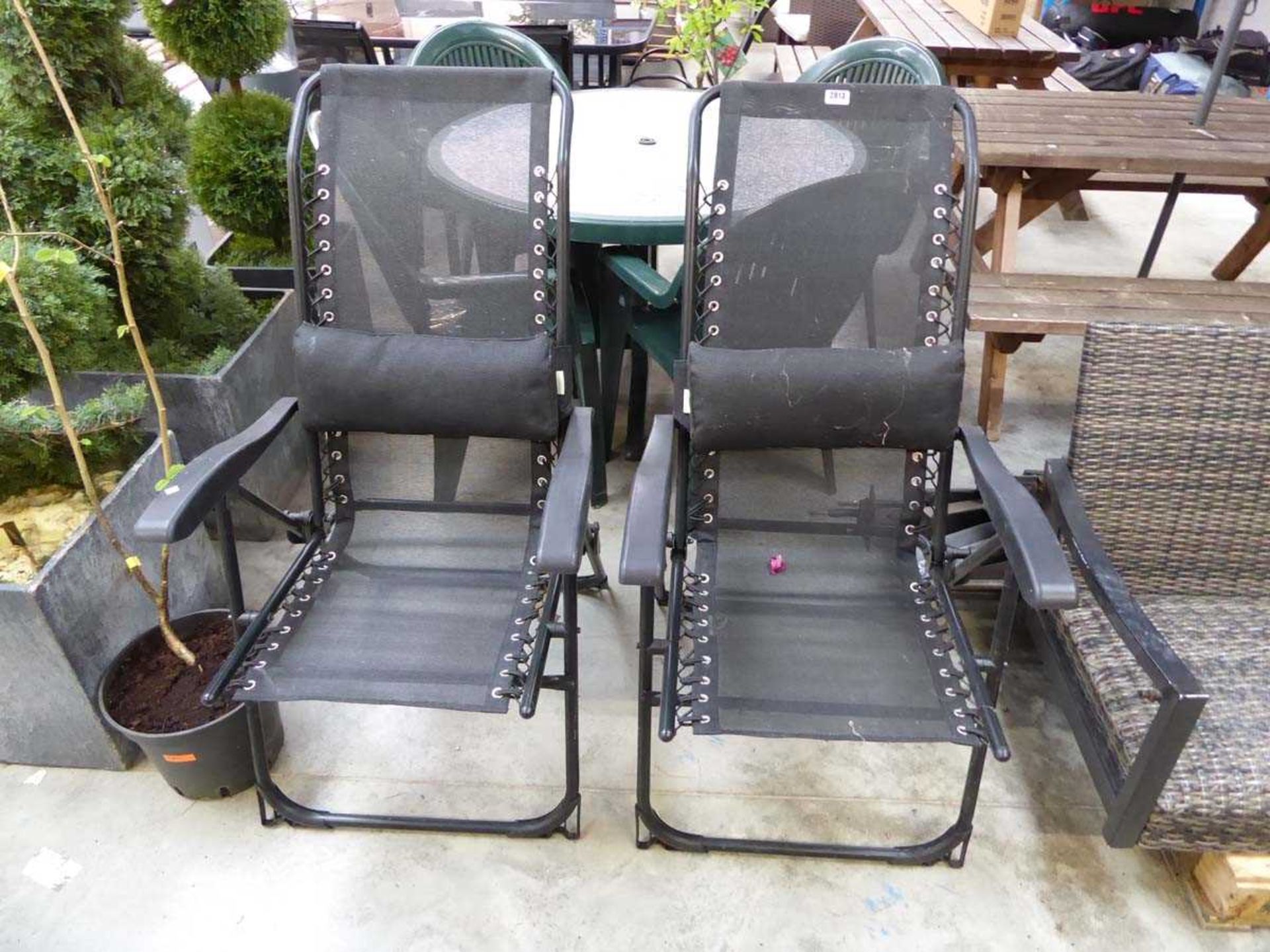 Pair of black folding reclining garden chairs