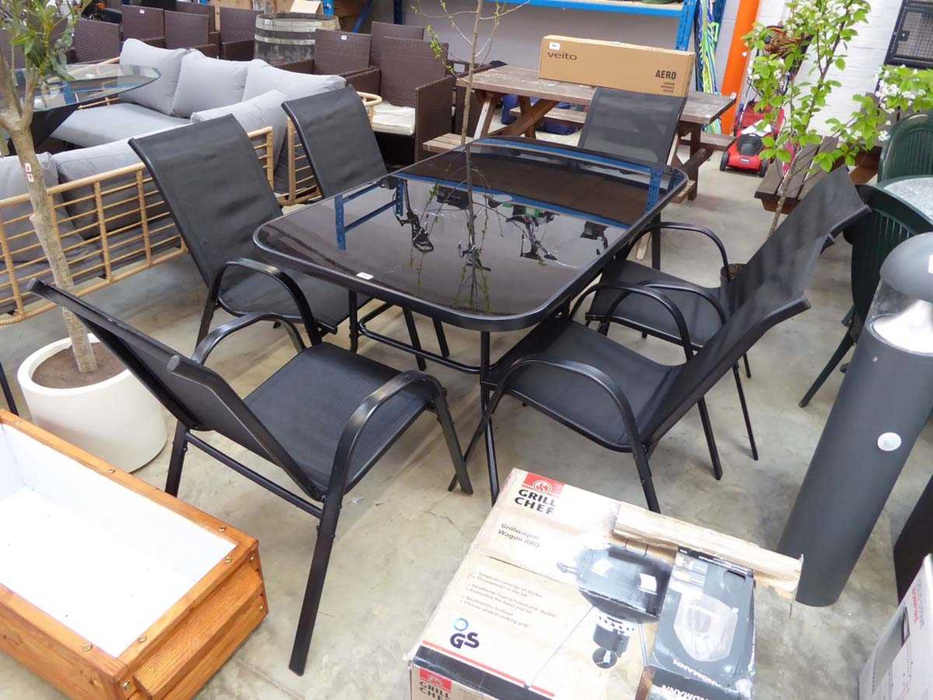 Modern black metal framed garden suite comprising table and 6 chairs