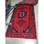 217 x 120cm. Persian blue, red and purple figured and bordered hall runner