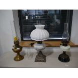 3 various oil lanterns each with glass funnel, and one further spare funnel