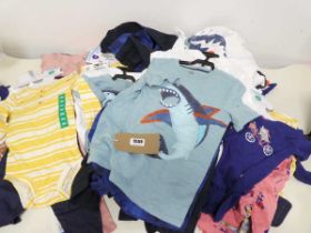 Mixed bag of childrens clothing to include t shirts, shorts, trousers etc.