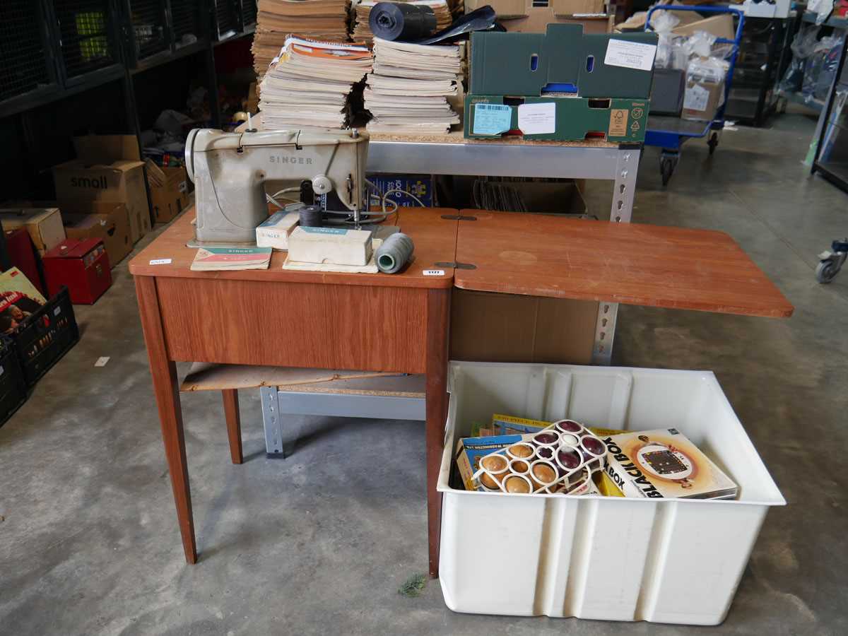 Vintage Singer sewing machine with table Sold as a collector's item