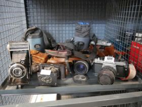 Cage containing various 35mm film cameras and lenses to include Pentax K1000, Pentax P30, various