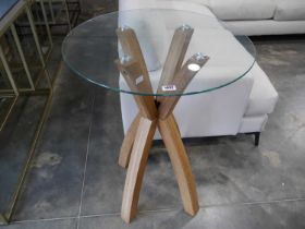 Bar height circular glass table on criss cross light oak base