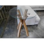 Bar height circular glass table on criss cross light oak base