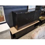 Modern black lounge suite to include a sideboard and long entertainment stand