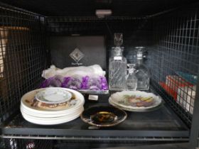 Cage containing various cut glasses, decanters, plates etc