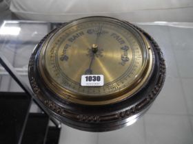 Dark oak cased circular wall barometer