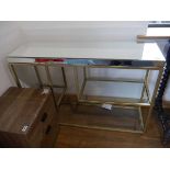 +VAT Gold finished console table with mirrored surface