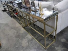 +VAT Gold finished console table with mirrored surface Smashed front panel