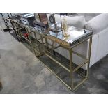 +VAT Gold finished console table with mirrored surface Smashed front panel