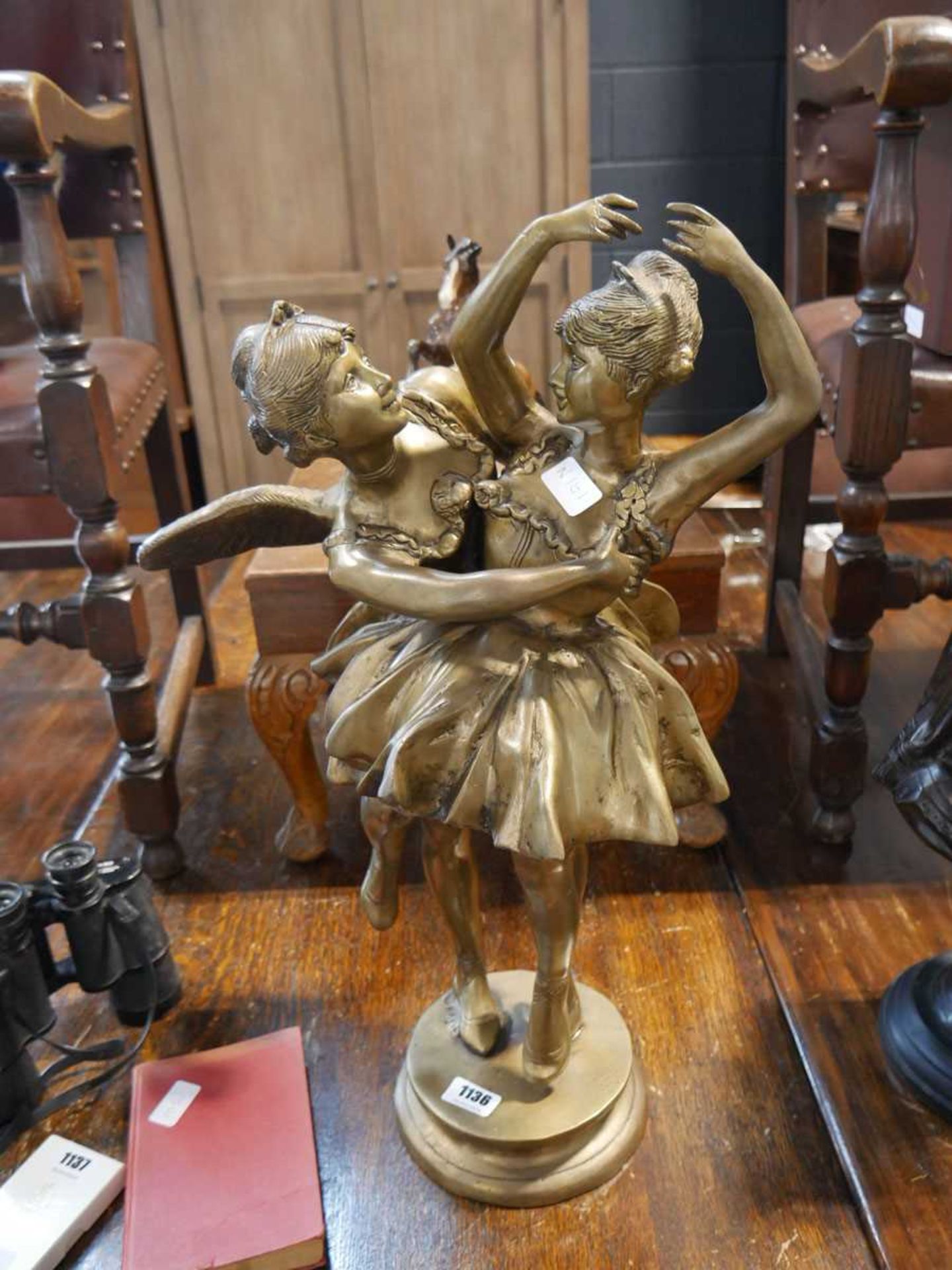 Brass ornament of 2 ballerinas