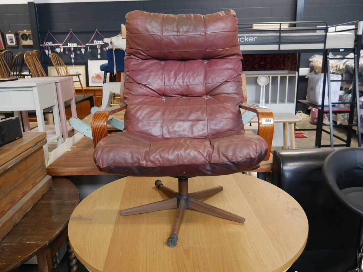 Mid century leather lounge chair on star base in the style of Gote Mobler